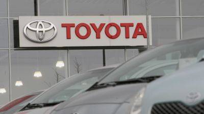 Akio Toyoda - Reuters - Toyota shareholders vote for chairman's re-election - cnbc.com - Japan