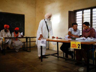 Photos: India votes in last phase of world’s largest electoral exercise