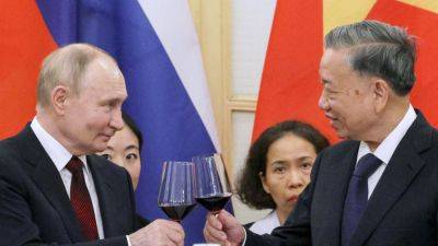Putin signs deals with Vietnam in bid to shore up ties in Asia to offset Moscow’s growing isolation