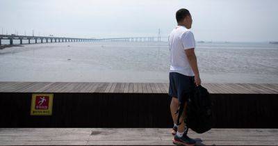 After Escaping China by Sea, a Dissident Faces His Next Act