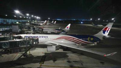 Malaysia Airlines flight to Bangkok makes a U-turn due to a pressurization issue - apnews.com - Malaysia - city Bangkok