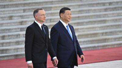 Andrzej Duda - Leader of NATO member Poland visits China, talks to Xi about Ukraine, peace and trade - apnews.com - China - Russia - Ukraine - Poland - city Beijing