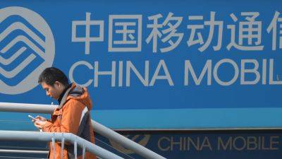 U.S. probing China Telecom, China Mobile over internet and cloud risks, Reuters reports citing sources - cnbc.com - China - Usa - Washington - county Mobile - city Beijing - city Washington