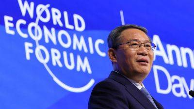 China's premier defends national competitiveness as trade tensions simmer