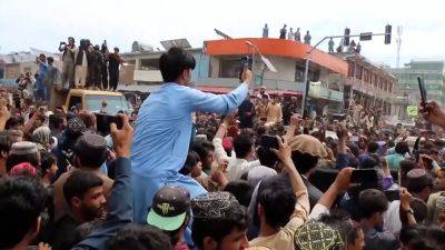 Afghans celebrate reaching cricket T20 World Cup semi-finals