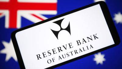 Australia's central bank says policy is restrictive, causing households pain