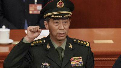 Xi Jinping - Dong Jun - Li Shangfu - Qin Gang - Former Chinese defense minister expelled from ruling Communist Party over graft allegations - apnews.com - China - city Beijing