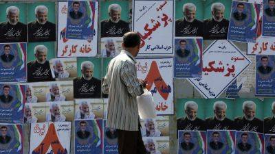 Khamenei protege, sole moderate neck and neck in Iran presidential race
