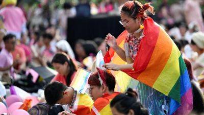 Clement Tan - TODAY - Singapore PAP MPs, opposition politicians attend LGBTQ rally despite pro-family scorecard - scmp.com - Singapore - county Park - city Singapore