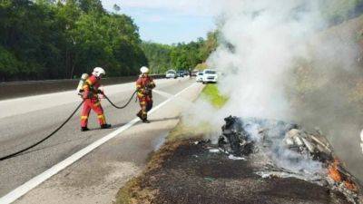 Driver dies after Lamborghini crashes, bursts into flames on Malaysia highway