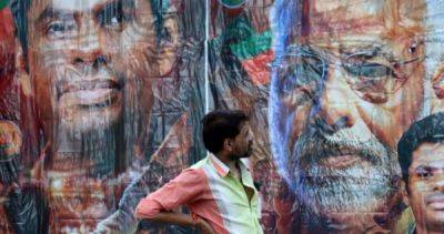 India shares plunge as polls show Modi's mandate slipping
