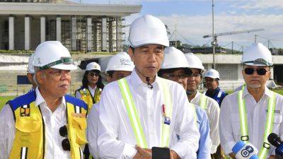 Indonesia’s leader says 1st phase of new capital is 80% complete and he’ll have an office there soon