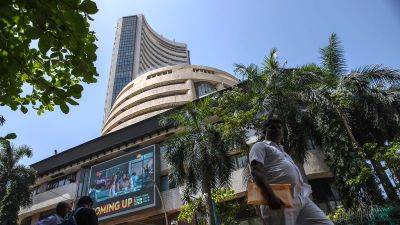 Indian stocks hit record highs as exit polls suggest big Modi win