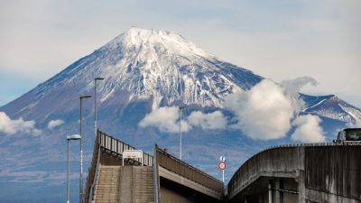 Agence FrancePresse - Another barrier to Mount Fuji photo taking is going up as tourists disturb residents - scmp.com
