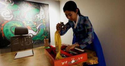 South Korea's young shamans revive ancient tradition with social media