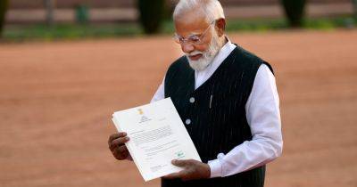 Modi, Striking a Modest Tone, to Be Sworn In for a Third Term