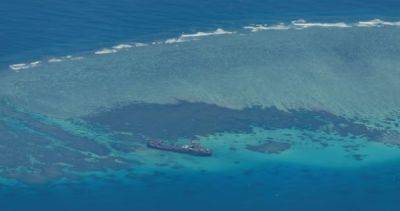 Jay Tarriela - China anchors 'monster ship' in South China Sea, Philippine coast guard says - asiaone.com - China - Philippines - Washington - city Beijing - city Manila - city Hague