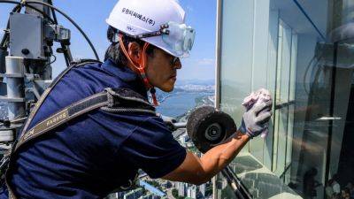 South Korea’s skyscraper window cleaner pushes past fear of heights - scmp.com - South Korea - city Seoul