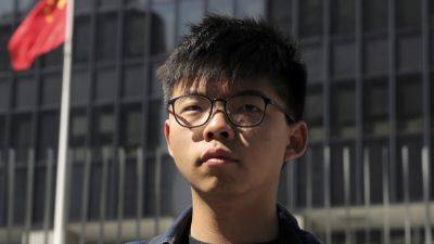 Joshua Wong - Hong Kong activist Joshua Wong asks for a lesser sentence in landmark security case - apnews.com - Hong Kong - city Beijing - city Hong Kong