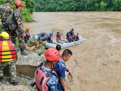 Pushpa Kamal Dahal - Bahadur Karki - More than 60 people missing after two buses swept into river in Nepal - aljazeera.com - Nepal - city Kathmandu