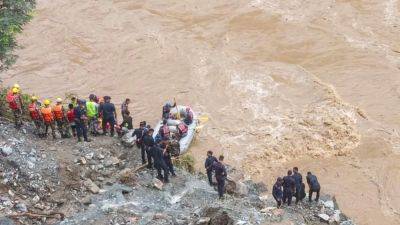 Agence FrancePresse - Pushpa Kamal Dahal - Nepal landslide sweeps 2 buses into swollen river, at least 63 missing - scmp.com - Nepal - republic Himalayan - city Kathmandu