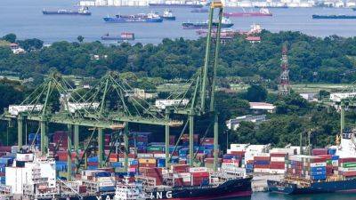 Singapore’s container ship snarl-up spills over into Malaysia