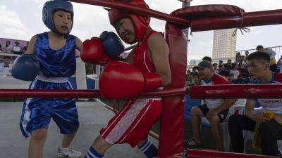 AP PHOTOS: A 12-year-old in Mongolia finds joy in boxing and now dreams of the Olympics - apnews.com - Mongolia - city Ulaanbaatar, Mongolia