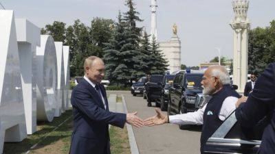 Putin hosts India’s prime minister to deepen ties, but Ukraine looms over their relationship