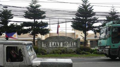 The Philippines investigates killing of 2 Australians and a Filipina in resort city hotel