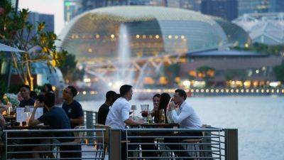 Air-conditioning, foreign holidays, eating out essential for Singaporeans: survey