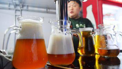 China's beer market, the world's largest, set for bounce as drinkers go high-end