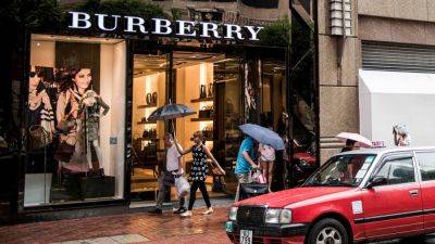 Burberry shares drop 16% after the luxury giant issues profit warning and replaces CEO