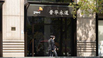 PwC weighs halving of China financial services audit staff, Reuters reports