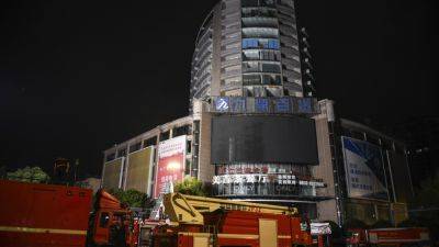 China investigators suspect construction work caused fire that killed 16 people in shopping mall