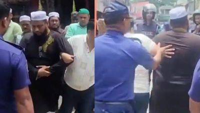 Video: Bangladesh police detain imam leading funeral prayers