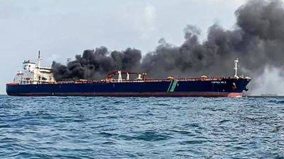 Malaysia coastguard says tanker involved in fire left site, was using dark-fleet waters