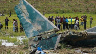 Relatives of 18 dead in Nepal plane crash demand answers