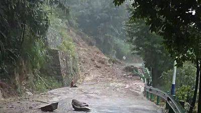KEN MORITSUGU - 11 killed by mudslide in China as heavy rains from tropical storm Gaemi drench region - apnews.com - China - Taiwan - Philippines - province Hunan - city Beijing - city Shanghai