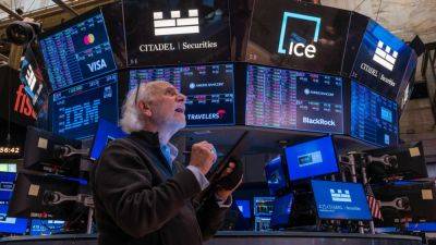 Stock futures rise slightly ahead of loaded week for tech earnings