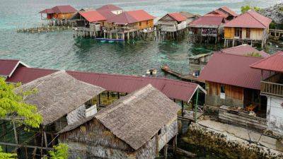 Indonesia’s sea nomads turn to jobs on land due to climate change, overfishing