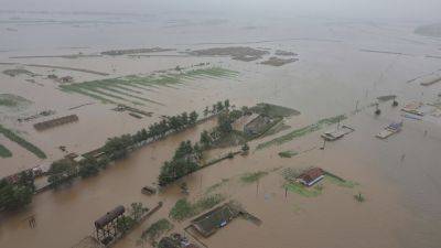 Recent rains in North Korea flooded thousands of houses and vast farmland, state media says