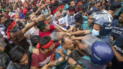 JULHAS ALAM - Bangladesh bans Jamaat-e-Islami party following violent protests that left more than 200 dead - apnews.com - Bangladesh - Pakistan - Britain - city Dhaka, Bangladesh