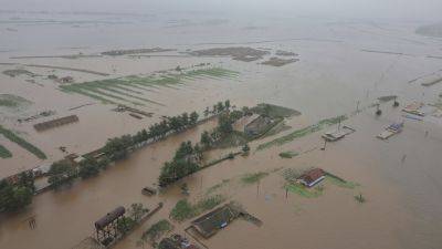 North Korean leader says thousands of flood victims will be brought to capital for temporary care