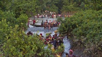 GRANT PECK - Ethnic armed group suspected of deadly attack in Myanmar on Rohingya trying to flee fighting - apnews.com - Burma - Bangladesh - city Bangkok