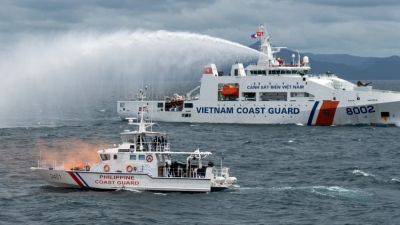 Bloomberg - Agence FrancePresse - Philippines and Vietnam coastguards hold first joint drills near South China Sea - scmp.com - China - Usa - Philippines - Vietnam - county Bay - county Lawrence - city Beijing - city Manila, county Bay