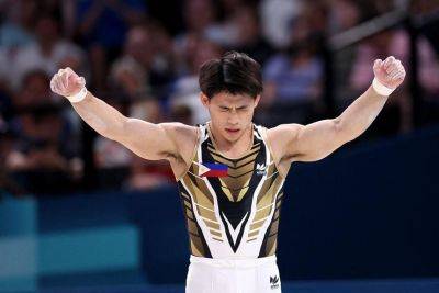 Mother-son feud playing out in public dulls shine of Filipino gymnast Carlos Yulo's gold medals