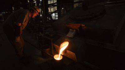 AP PHOTOS: 172-year-old Japanese factory preserves traditional way of making cast iron cookware