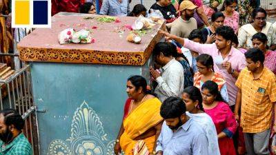 Hindu worshippers in India throng ‘visa temple’ to pray for successful path to the US