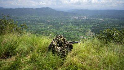 Indian soldiers drill for counterinsurgency amid rise in rebel attacks in Kashmir