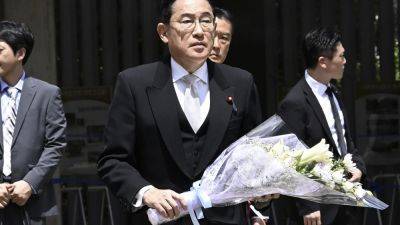 Fumio Kishida - Shinzo Abe - Minoru Kihara - MARI YAMAGUCHI - Kishida vows to push rules-based order as Japan’s defense chief visits Yasukuni 79 years after WWII - apnews.com - Japan - China - city Tokyo